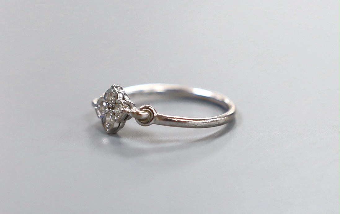 An Italian Cartier 750 white metal and four stone diamond cluster ring, size L, gross weight 2 grams, the shank numbered 53 G 34753.